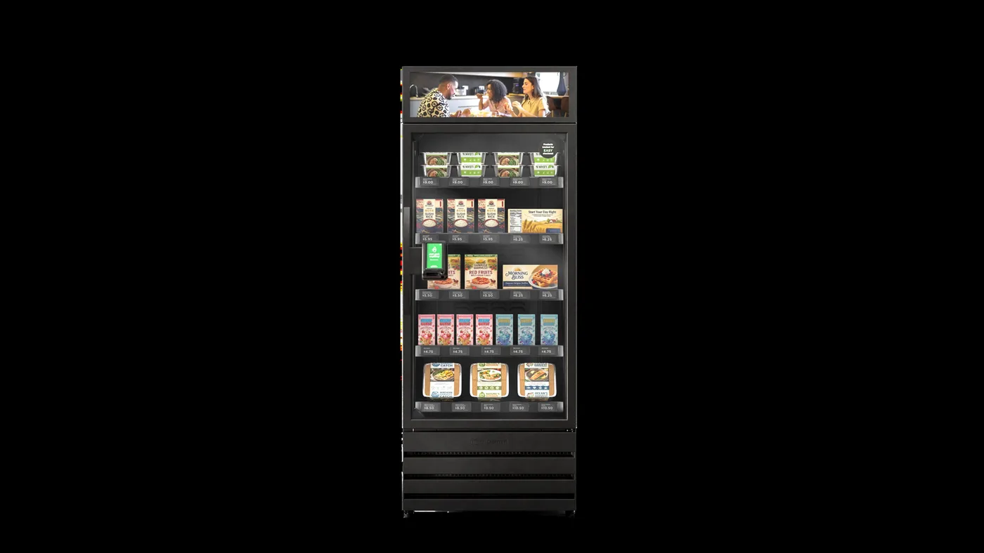 Glass-front smart cooler stocked with fresh meals and drinks